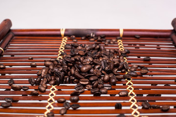 Coffee beans on a bamboo stand