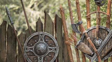 ancient wall with weapons and swords