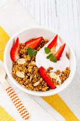 Strawberry Cinnamon Granola Yogurt Breakfast. Selective focus.