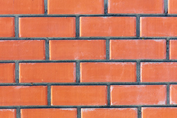 Obraz premium Ściana z czerwonej cegły jako abstrakcyjne tło