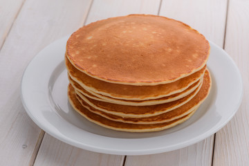 Piled pancakes on the plate