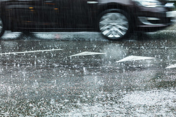 Rain on the asphalt road as background