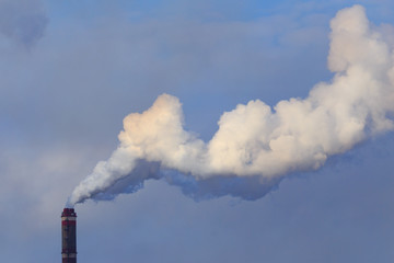 Smoke from the pipes of the factory