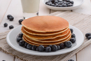 Delicious pancakes with fresh berries