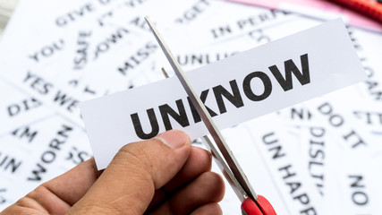 Unknow text or word meaning on paper in hand holding