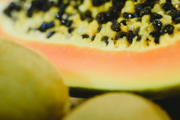 Group of fruits papaya, grape, kiwi and bananas