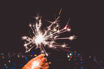 Bengal lights. Fireworks. Relationship. Lights of the night city. Glow. Celebration. Mood.