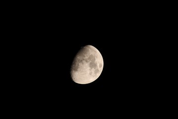 Partial Gibbous moon in the night sky