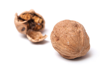closeup of walnuts on white background