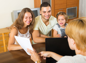 Family with insurance agent