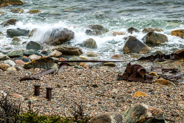 Wreckage of the SS Ethir stewn on the beach during rough seas, Gros Morne National Park,...
