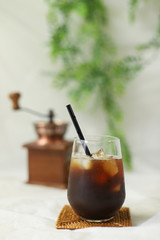 Iced coffee black coffee isolated on white table
