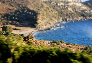 Quiet, deserted beach on the shore of the Mediterranean Sea. Marmaris, Turkey. Tilt shift effect.