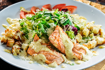 health dinner - atlantic light roast fish sea tuna served on plate with vegetables and lemon isolated on white background