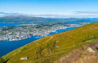 Fototapeta premium Aerial view of Tromso and Tromsoysundet strait in Norway