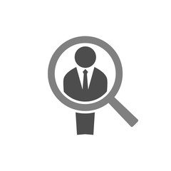 Businessman silhouette and a magnifier. Employee recruit concept icon. Man figure and magnifying glass icon. Employee recruitment.