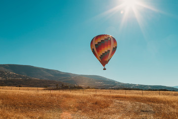 Naklejka premium Hot Air Balloon Ride Over The Wasatch Mountains In Utah USA