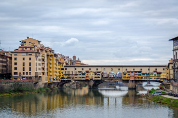 Medieval bridge Ponte Vecchio (Old Bridge) and the Arno River in Florence, Tuscany, Italy.