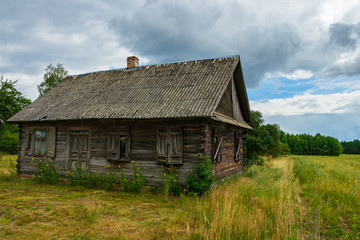 Fototapeta na wymiar old wooden house in eastern Poland