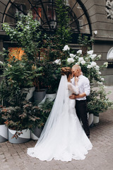 Walking newlyweds in nature.
