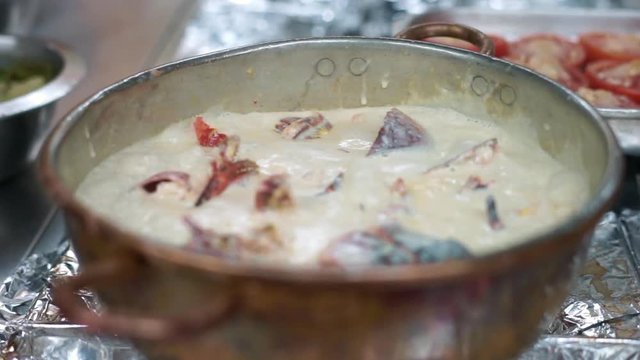 Lobster boiled in milk and wine sauce in the restaurant