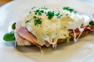 Close-up of a delicious and nutritious sandwich with poached egg.