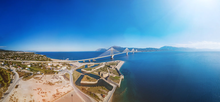 Fortress and bridge of Rio Antirio, Patra, Greece. Aerial drone bird's eye view photo.