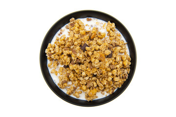 Muesli with chocolate and milk isolated on white background