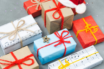 Christmas gifts and Santa's red hat.New year, winter holiday.