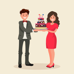 A man gives a woman a cake in honor of Valentine s day.