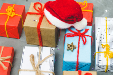 Christmas gifts and Santa's red hat.New year, winter holiday.