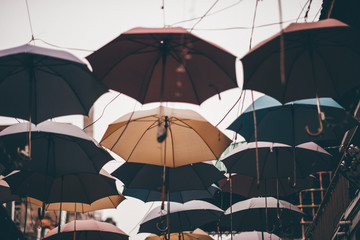Fototapeta na wymiar Street hanging umbrellas