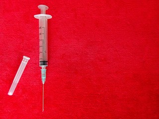 Medicine Medical Health Industry Transparent Plastic Syringe For Drugs Medicament Vaccine Injection Tool On The Red Textile Cloth Velvet Background 