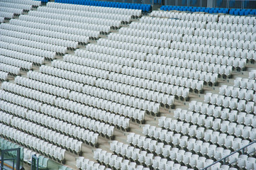 Fototapeta premium Empty white seats in stadium
