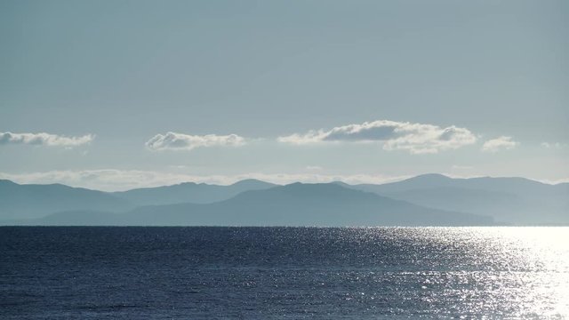 Greek sea coastline with mountains, Greece Peloponnese. Time lapse