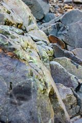 Textured boulders with sky backgrounds