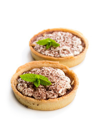 Mini  banoffee pie tarts isolated on white
