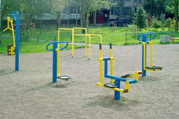 Sports equipment in the courtyard of residential high-rise buildings.