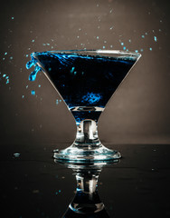 blue cocktail with splash isolated 