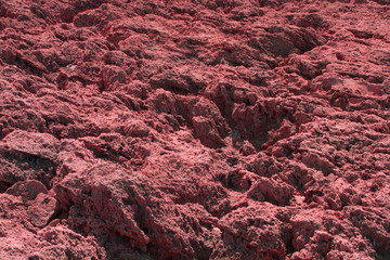 Stone surface purple background, uneven rock texture