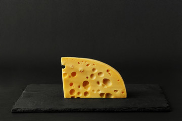 yellow cheese on black rocj desk