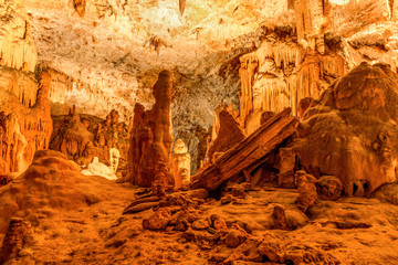 Cave from the Jurassic period with stalactites and stalagmites, located near the town of Molain in France.