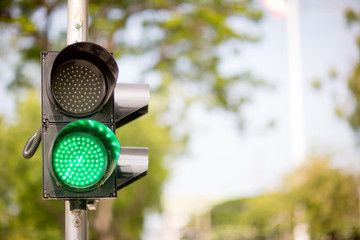 Green Traffic lights, traffic sign for pedestrians on background.sign of ready cross. image for...