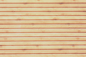 The texture is wooden, the background is made of natural wood. Strip boards.