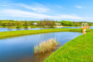 Small lake in spring season near Alwernia village, Poland