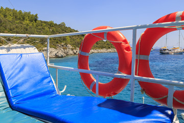 Safety rings on boat in Green sea bay in Marmaris, Turkey
