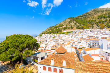 View of white houses in mountain valley in picturesque village of Mijas, Andalusia, Spain © pkazmierczak