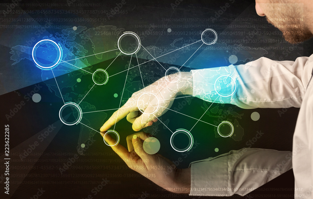 Poster Male hands touching interactive table with colorful world map on it 