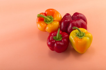Sweet bellpepper on a colored background. Studio light. Top view
