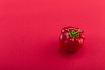 Sweet bellpepper on a colored background. Studio light. Top view